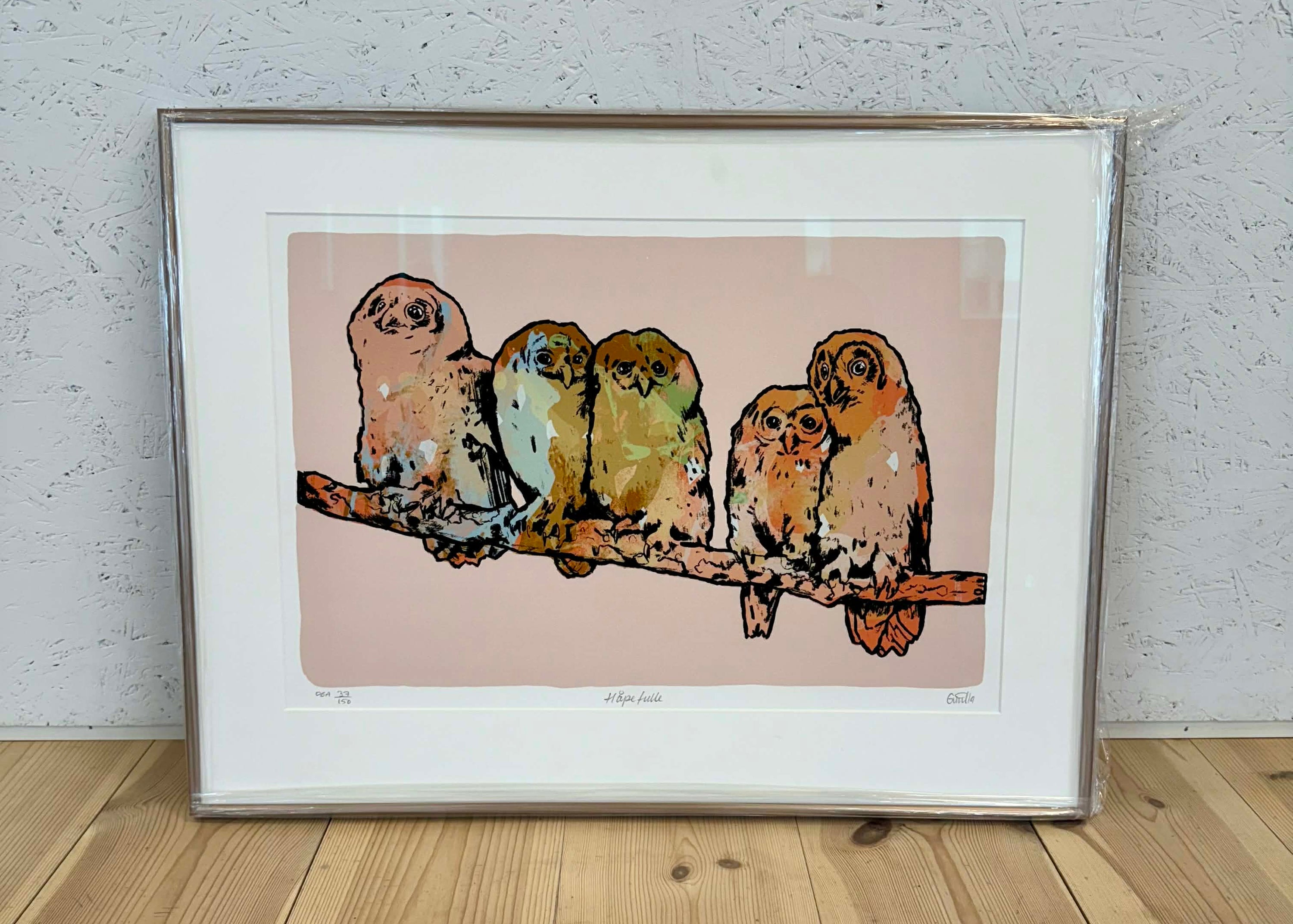 Håpefulle, innrammet